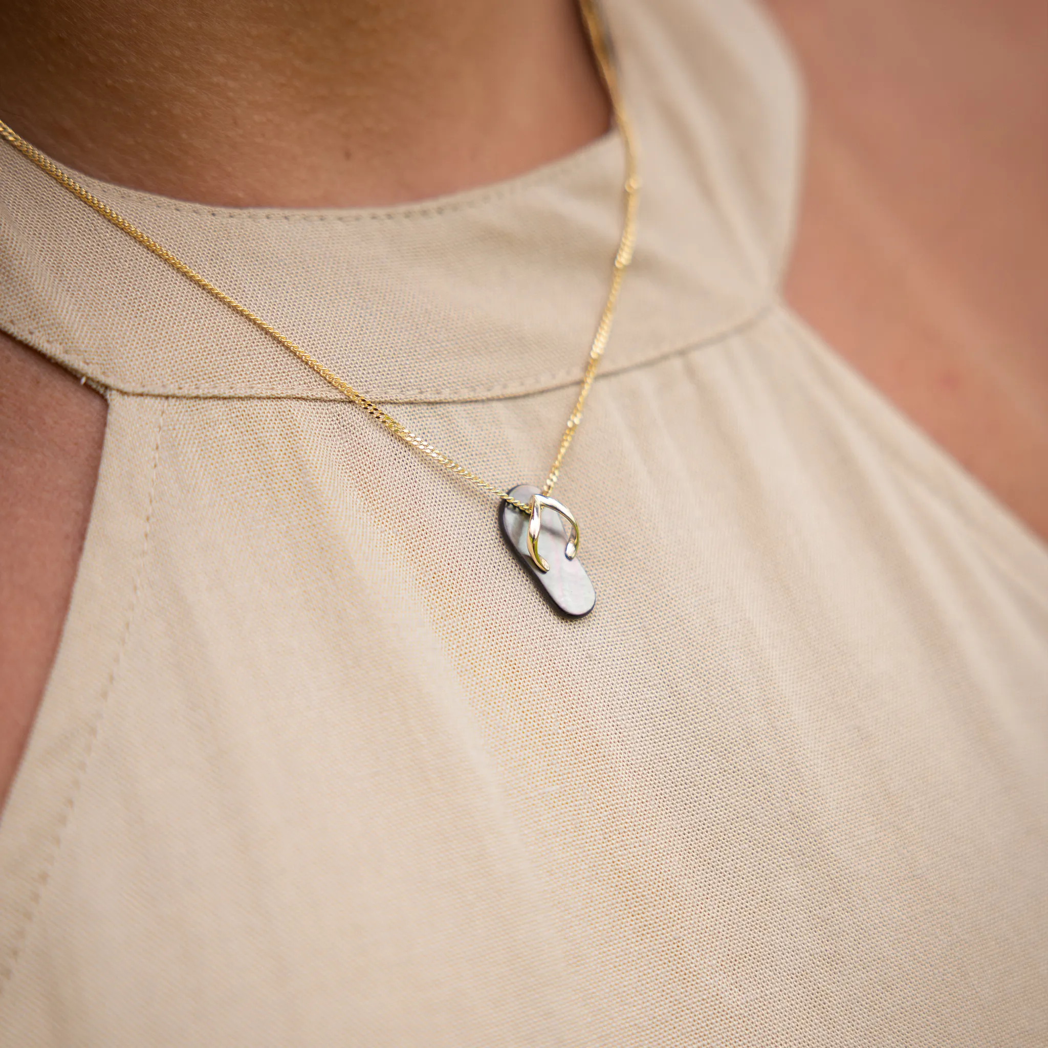 Black Mother of Pearl Slipper Pendant in Gold